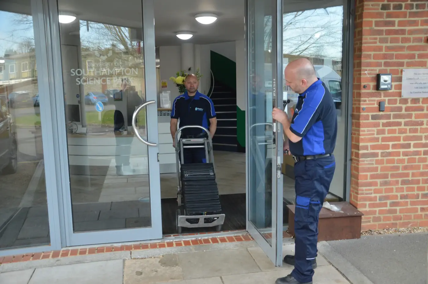 Laptops being collected from office building