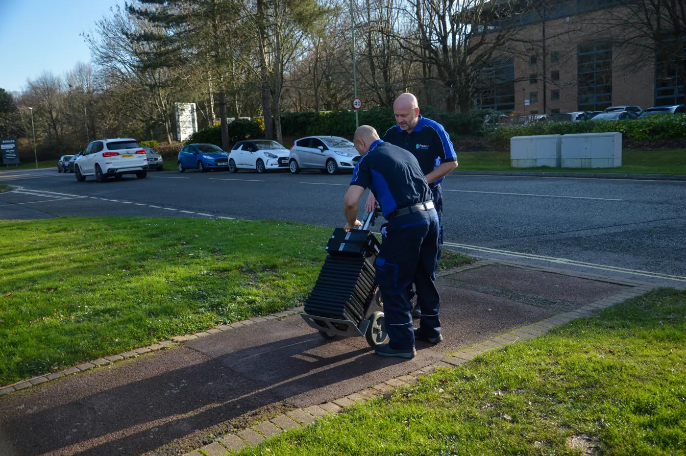 Laptops being collected from office building
